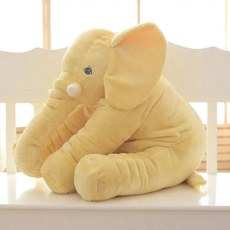 Yellow plush elephant toy.