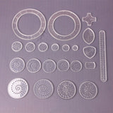 Set of mechanical gear components on a gray background