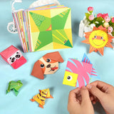 Colorful paper crafts including animals and shapes on a light blue background.