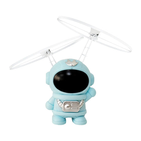 Toy helicopter with an astronaut design on a white background