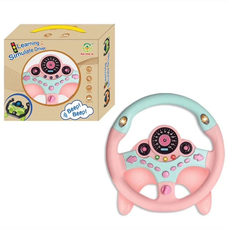 Pink toy steering wheel with a matching box on a white background