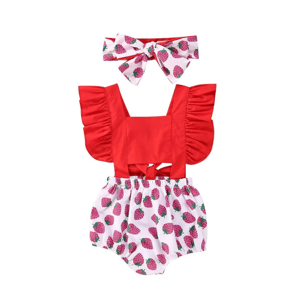 Red top and strawberry print shorts with matching headband on a white background