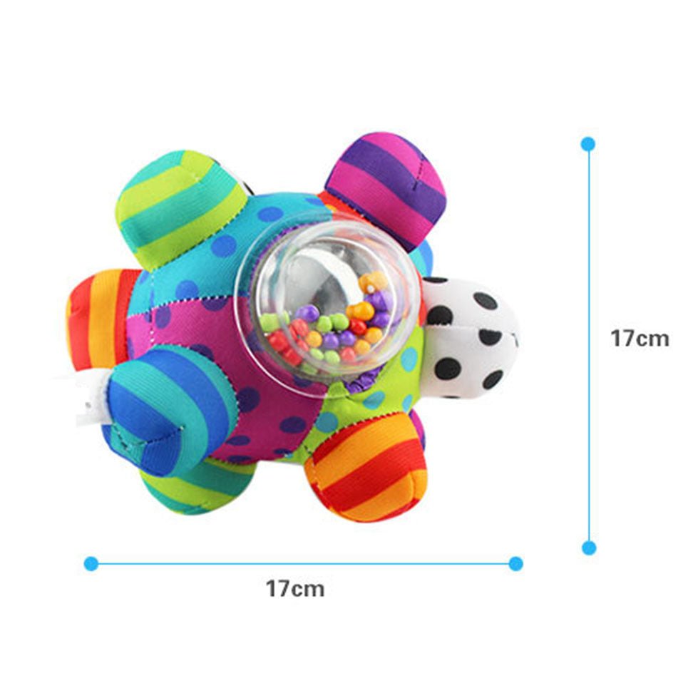 Colorful baby toy with a clear center filled with beads, dimensions indicated on a white background.