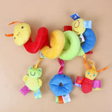 Colorful baby toy with letters and animals on a beige background