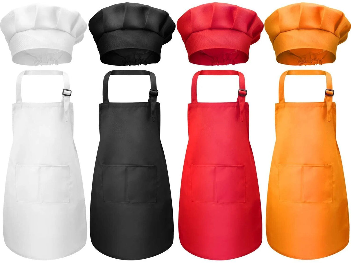 Set of chef hats and aprons in white, black, red, and orange.