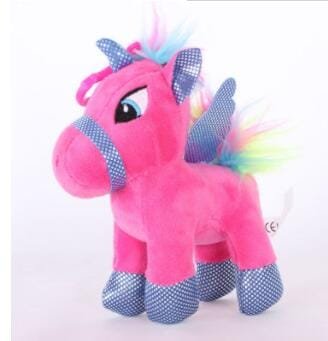 Pink unicorn plush toy with rainbow hair on a white background