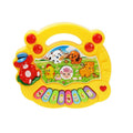 Colorful toy with animal illustrations and a keyboard on a white background
