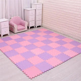 Checkered pink and purple mat on a light wooden floor with a pink chair and white drawers in the background.