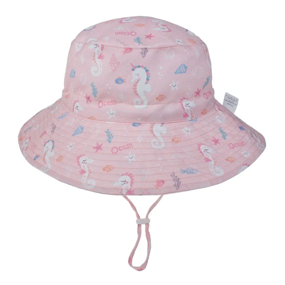 Pink children's bucket hat with ocean-themed design on a white background