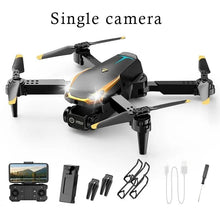 8K Pro Drone folded quadcopter with accessory pack for portable travel flying and outdoor photo adventures.