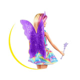 Toy doll with purple butterfly wings and a colorful dress on a white background