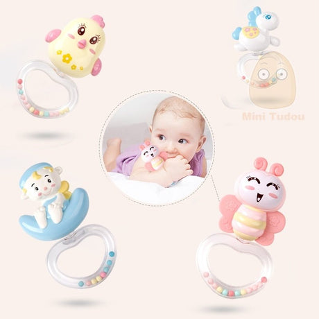 Set of colorful baby toys with a baby holding one, branded 'Mini Tudou'.