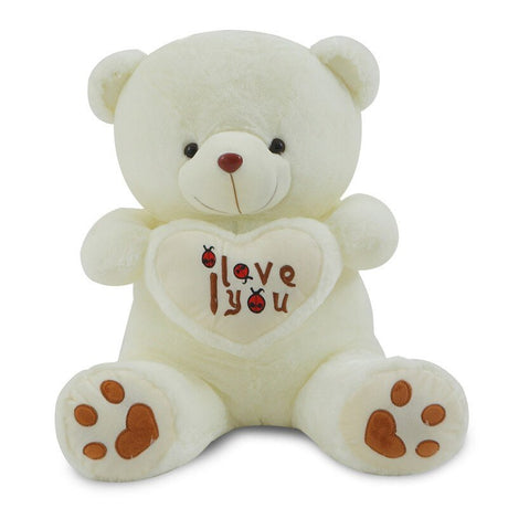 White teddy bear with a heart that says 'I love you' on a white background