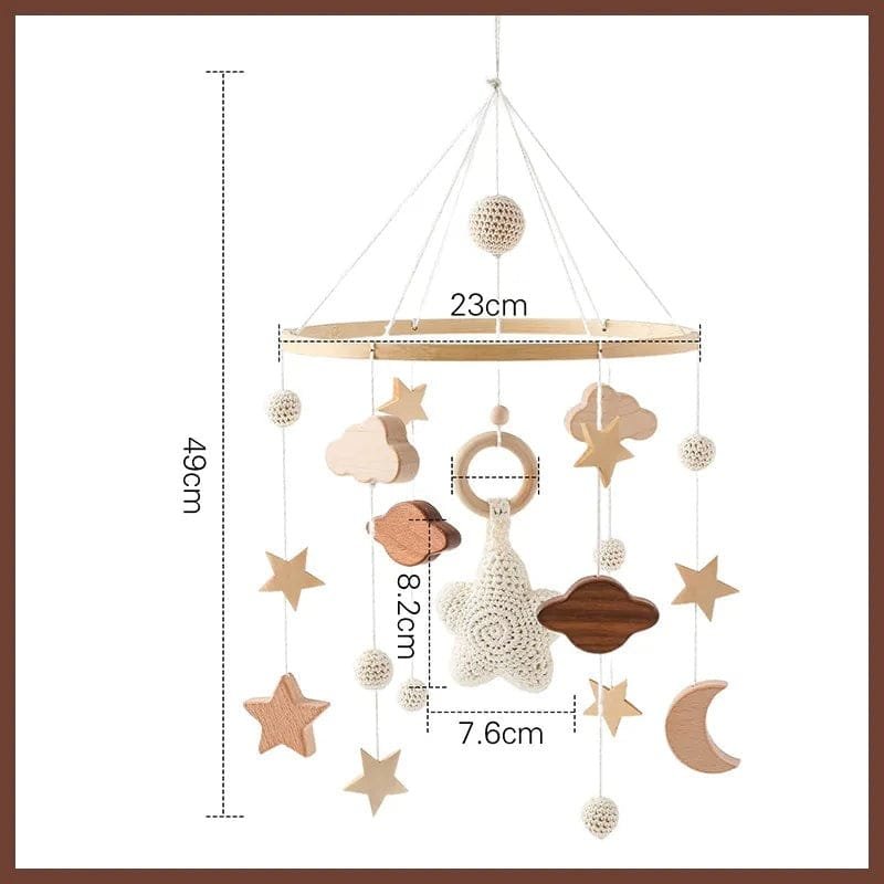 Wooden baby mobile with stars, moons, and animals, shown with measurements on a white background.