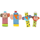 Set of colorful baby toys with monkey faces on a white background