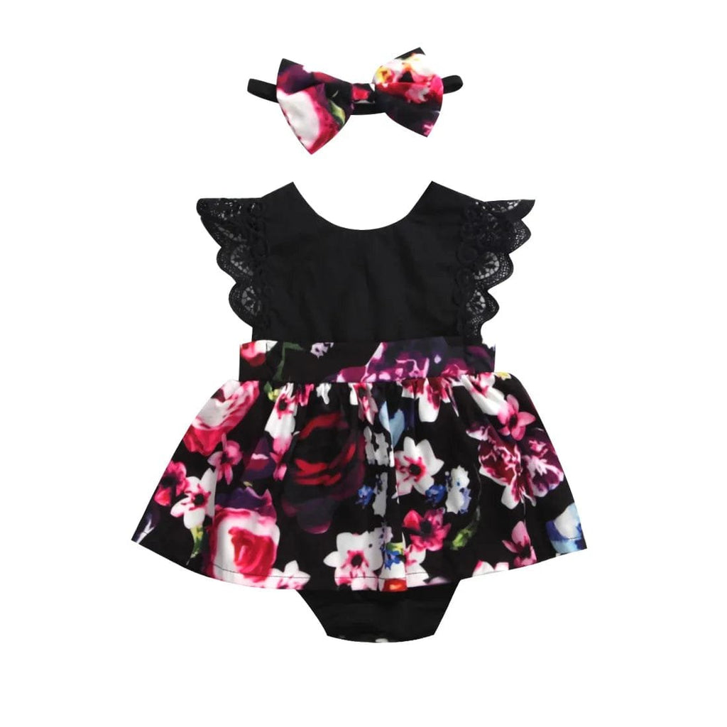 Black lace top with floral skirt and matching headband on a white background