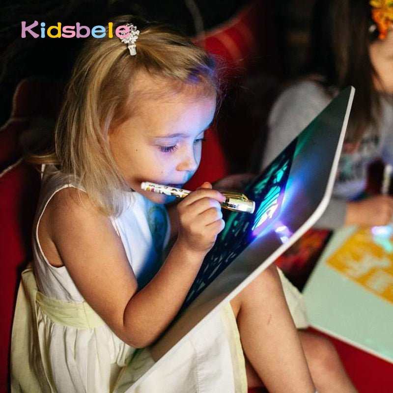 Child using a stylus on a digital tablet with 'Kidsbel' branding.