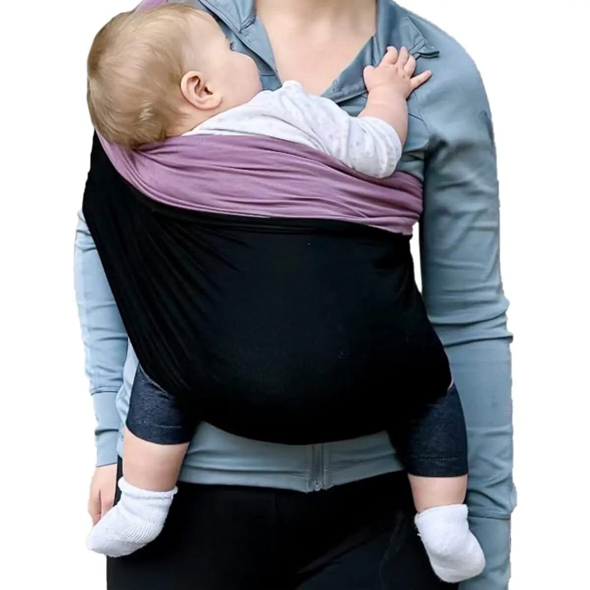 A person using a baby carrier with a baby.