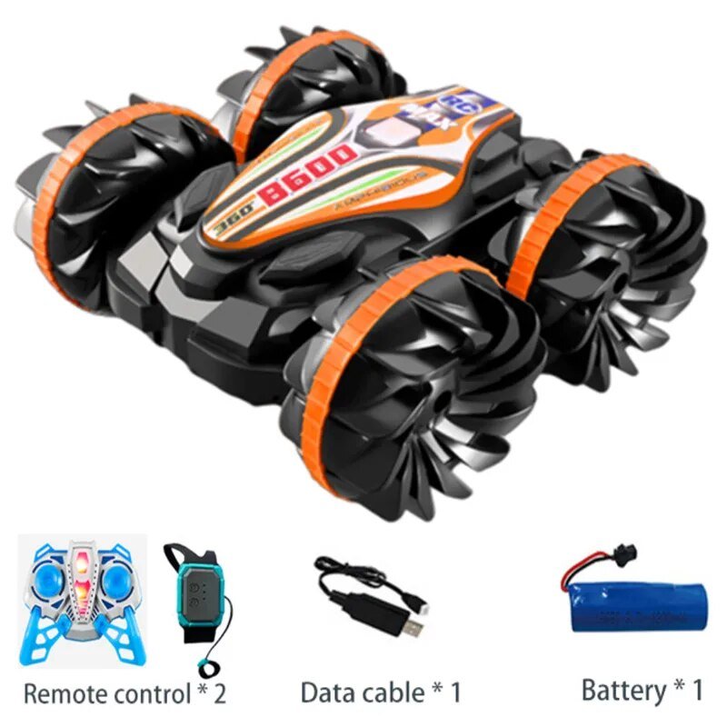 Black and orange remote-controlled vehicle with accessories.