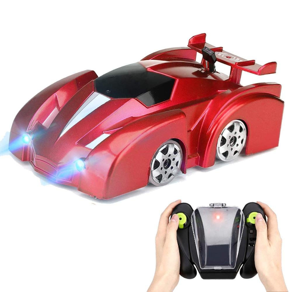 Red toy car with glowing lights and a remote control.