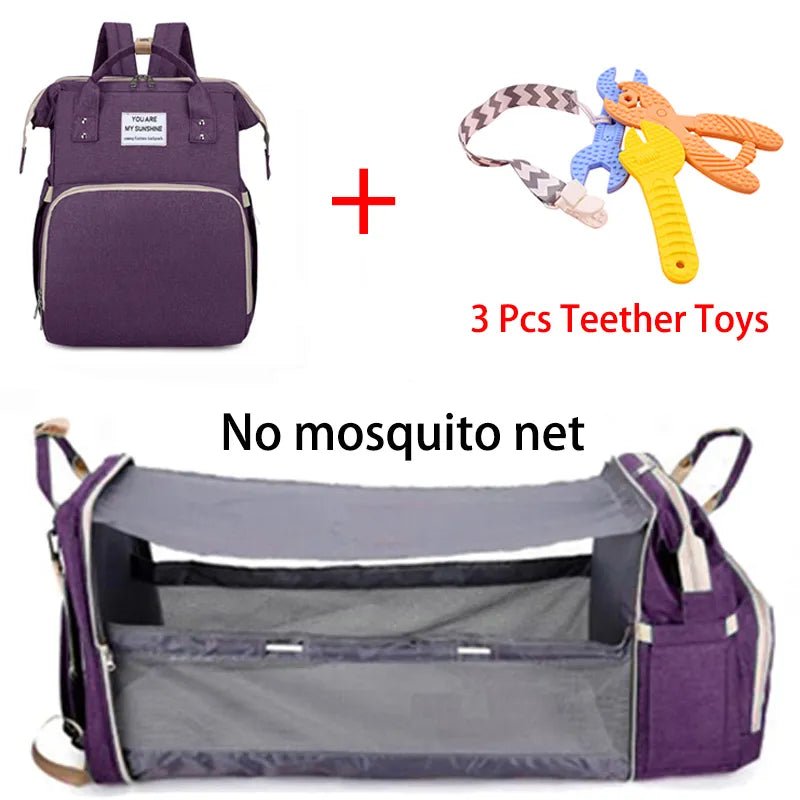 Purple baby bag with a gray interior, teether toys, and a no-mosquito-net label 