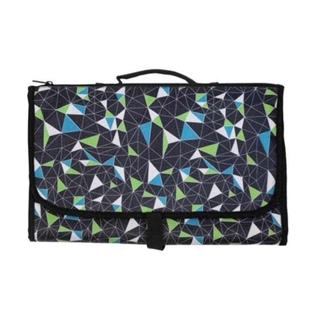 Foldable picnic blanket with geometric pattern.