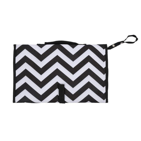 Black and white chevron patterned bag with a strap on a white background