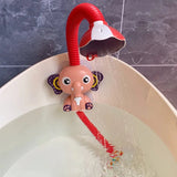 Red elephant-shaped shower head with a flexible hose in a bathtub.