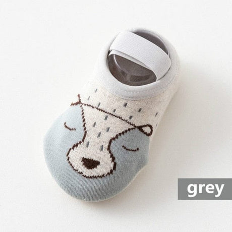 Gray baby sock with a dog design