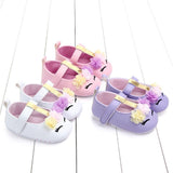 Set of four children's shoes with unicorn designs 