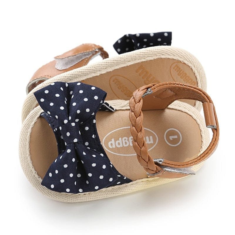 Baby sandal with navy polka dot bow 