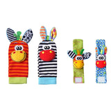 Set of colorful baby rattle toys with animal designs.