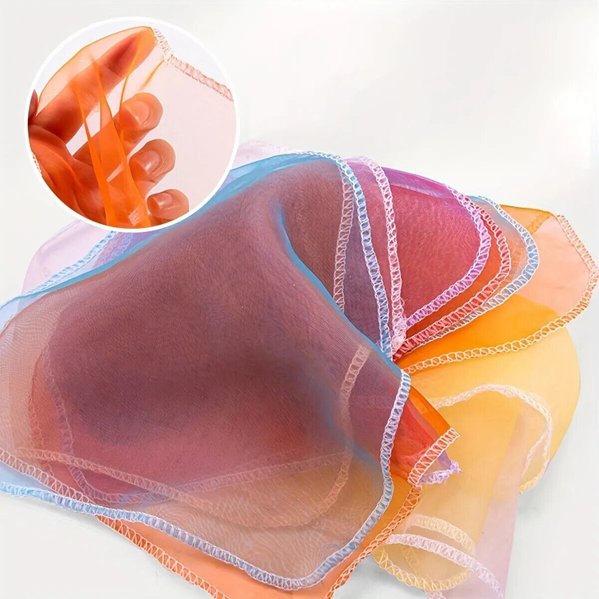 Colorful sheer fabric with a close-up inset showing texture details.