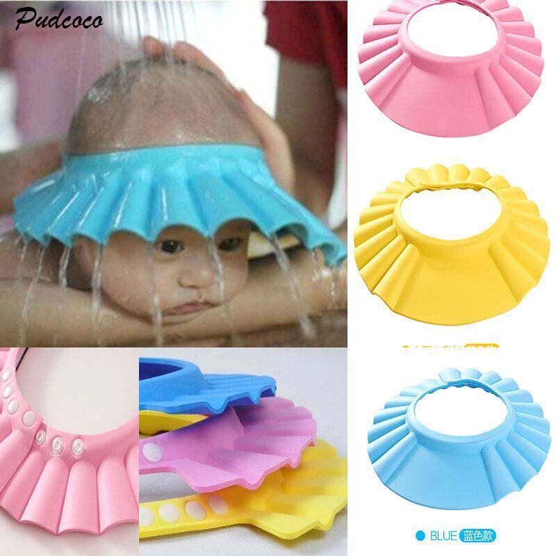 Baby shower caps in various colors with a child using one of them.