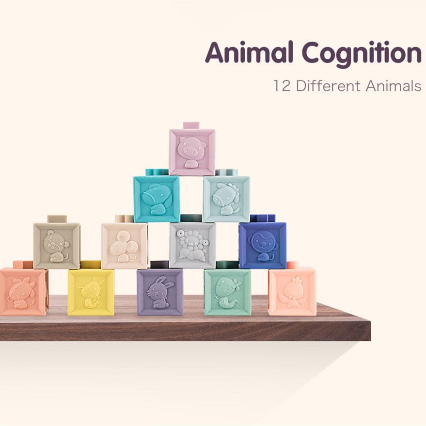 Colorful blocks with animal designs stacked on a wooden surface, labeled 'Animal Cognition' with '12 Different Animals'.