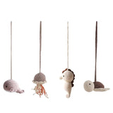 Set of four crocheted animal toys hanging from strings