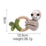 Baby teething ring with sloth design and measurements on a white background