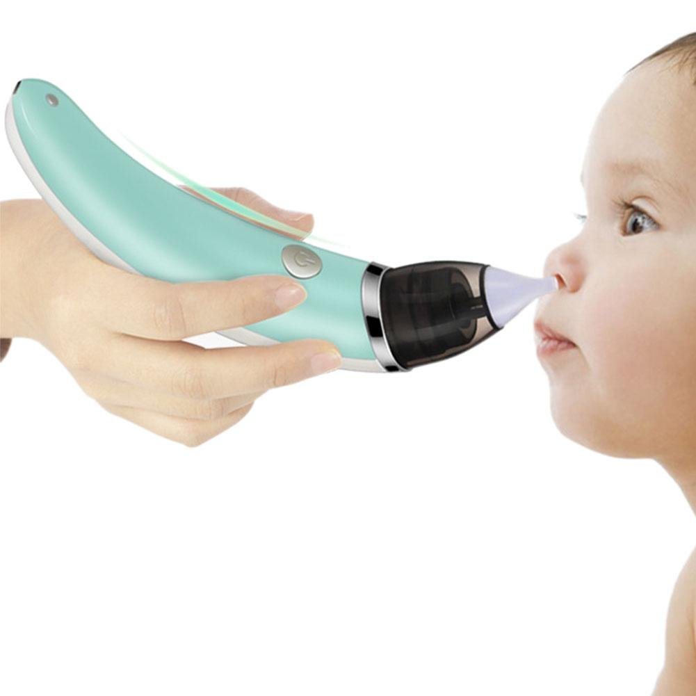 Baby using a nasal aspirator.
