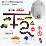 Toy road set with cars, traffic signs, and storage bag.