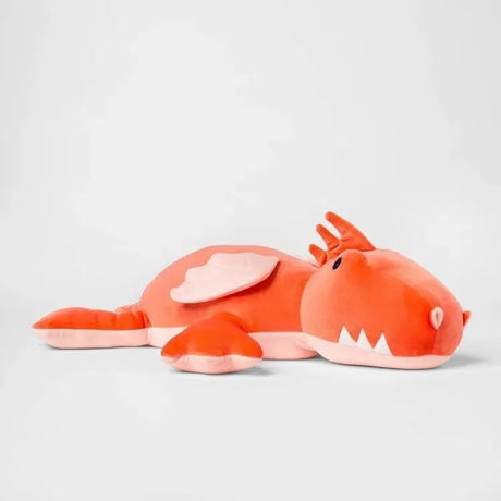 Plush toy resembling a red dragon