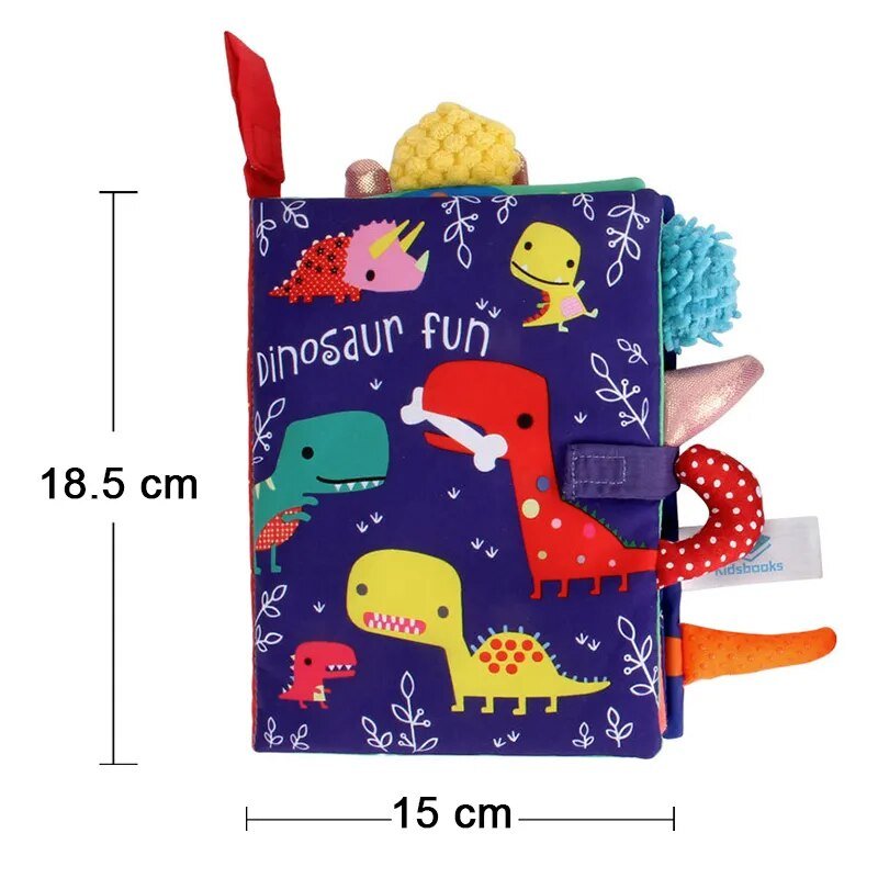 Children's soft book with dinosaur illustrations and interactive elements, shown with dimensions.