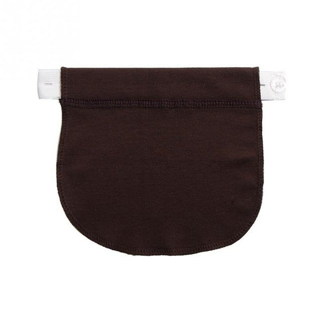 Brown fabric extender with a white clip on a white background