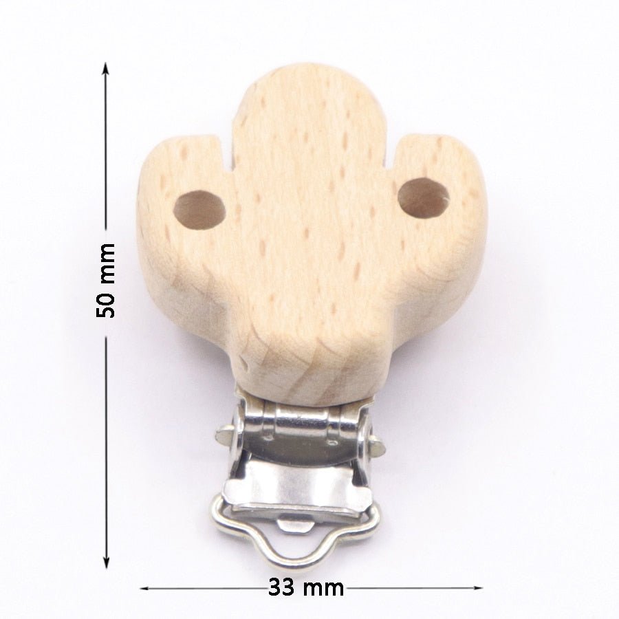 Wooden pacifier clip with dimensions on a white background