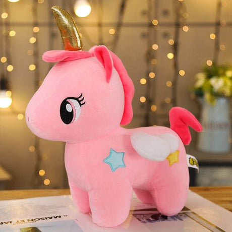 Pink plush unicorn toy