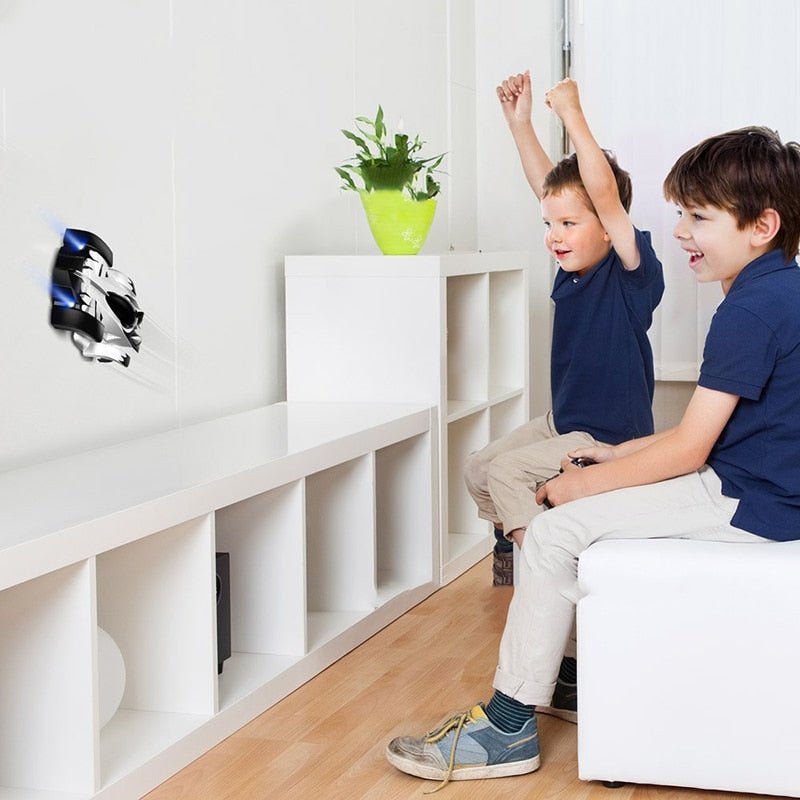 Two children playing in a modern living room with white furniture and a plant.