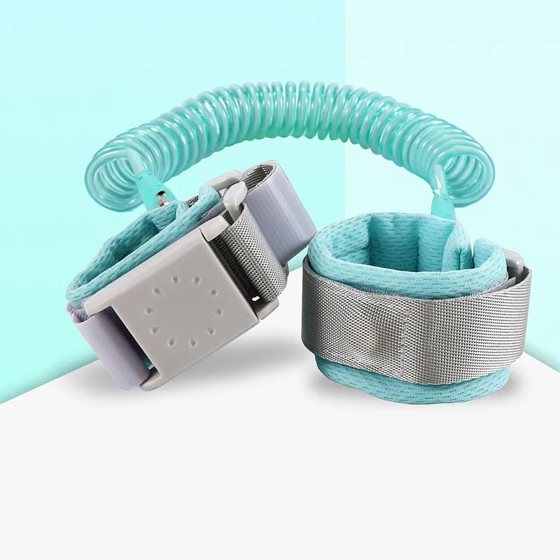 Two coiled safety straps with gray buckles.