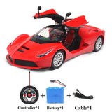 Red toy car with controller, battery, and cable