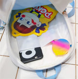 Colorful Paka Paka toy with a clown design