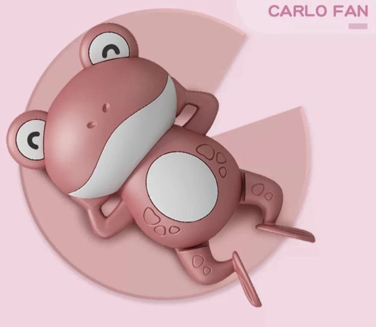 Pink cartoon shark-shaped bath toy.