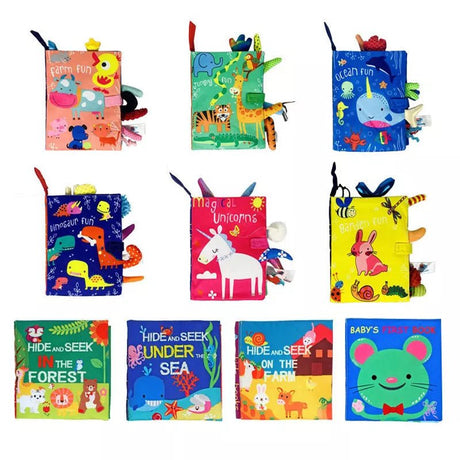 Collection of colorful children's soft books with various designs on a white background